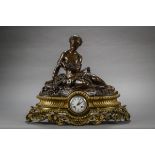 Large mantel clock in bronze 'resting lady', Raingo à Paris (59x72x24cm)