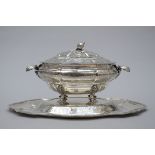 A fine engraved souptureen with plate