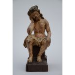A statue in sculpted wood 'Christ on the cold stone' (h36cm)