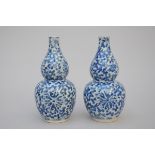 A pair of Chinese blue and white porcelain gourd vases, 19th century (h23 cm) (*)