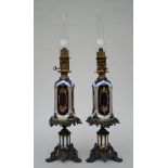 A pair of Bayeux porcelain oil lamps with bronze mounts (h64cm)