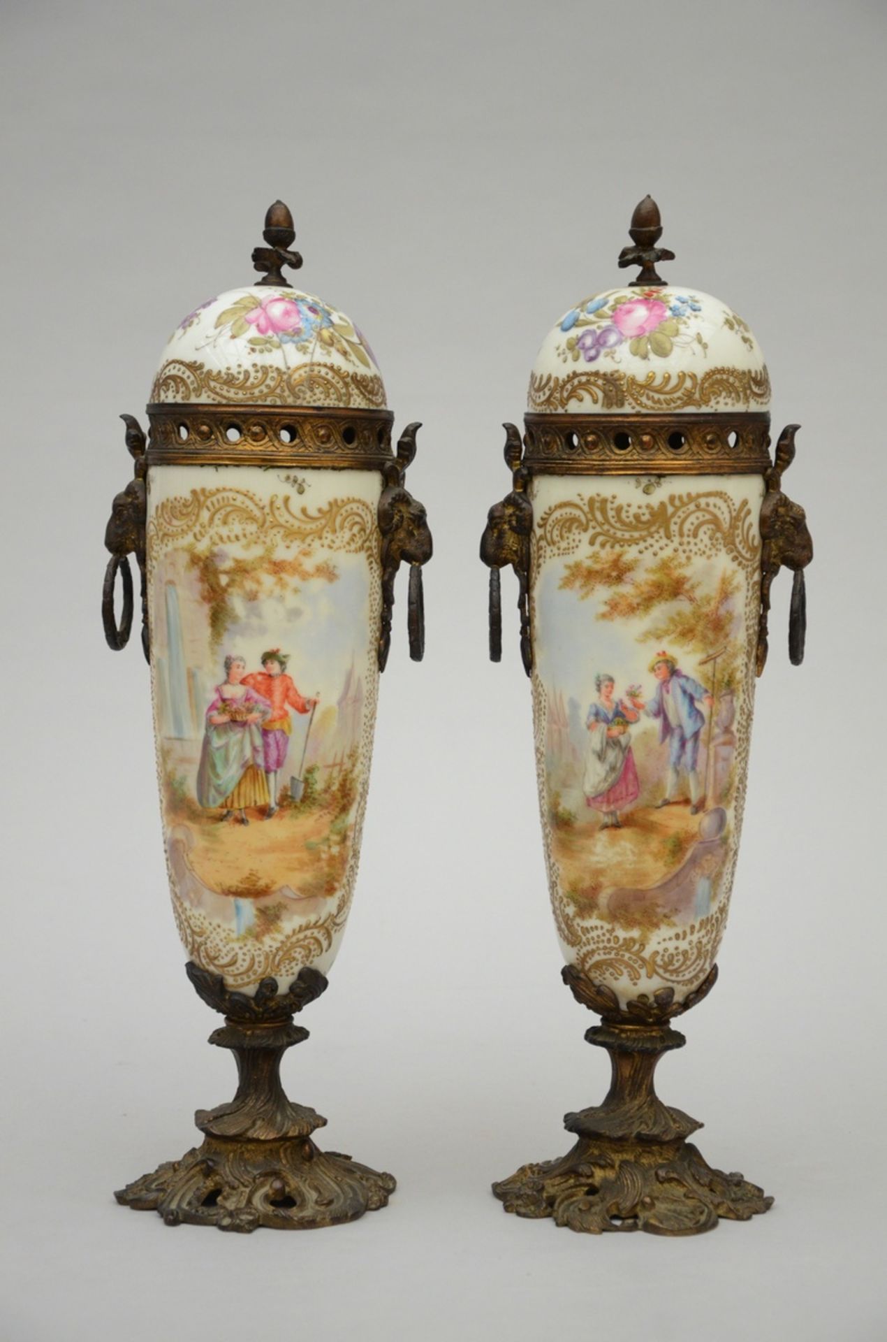 Two porcelain vases with bronze mounts (h46cm) (*)