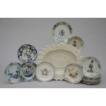 Lot: charger (43x53x6cm) and 15 plates in faience (from dia 20 to 25cm) (*)