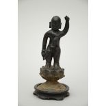 A Chinese bronze sculpture 'Buddha as a child' Ming dynasty (17cm)