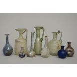 Lot: 9 glass bottles Roman (?) (from 4.5 to 14cm)
