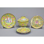 A group of Chinese Canton enamelled items to include a cup and cover with matching saucer.