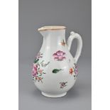A Chinese famille rose porcelain cream jug with floral decoration. Qianlong period (1735-1796).