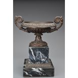 A Neoclassical style bronze urn on stone pedestal. Approx. 20cm tall Overall good condition with