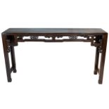 A Chinese 19/20th century carved wood alter table with open fretwork frieze with pierced