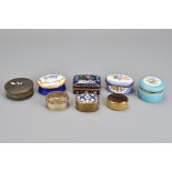 An assortment of eight powder boxes, to include Halcyon Days enamel, cloisonnŽ, stone, porcelain,