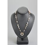 CARTIER Trinity pearl necklace. Rose gold chain sectioned by graduated pearl beads with three