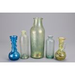 Four Miniature Glass Bottles, together with one larger bottle, all circa 19th Century, tallest 19