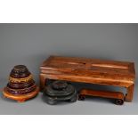 A Chinese hardwood footrest / footstool 'gundeng' of rectangular form with two cylindrical