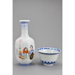 A Chinese mid-20th century porcelain bottle vase finely decorated in enamels depicting two ladies