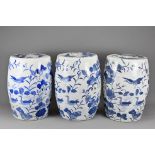 A set of three Chinese vintage blue and white porcelain drum stools. Each decorated with birds in