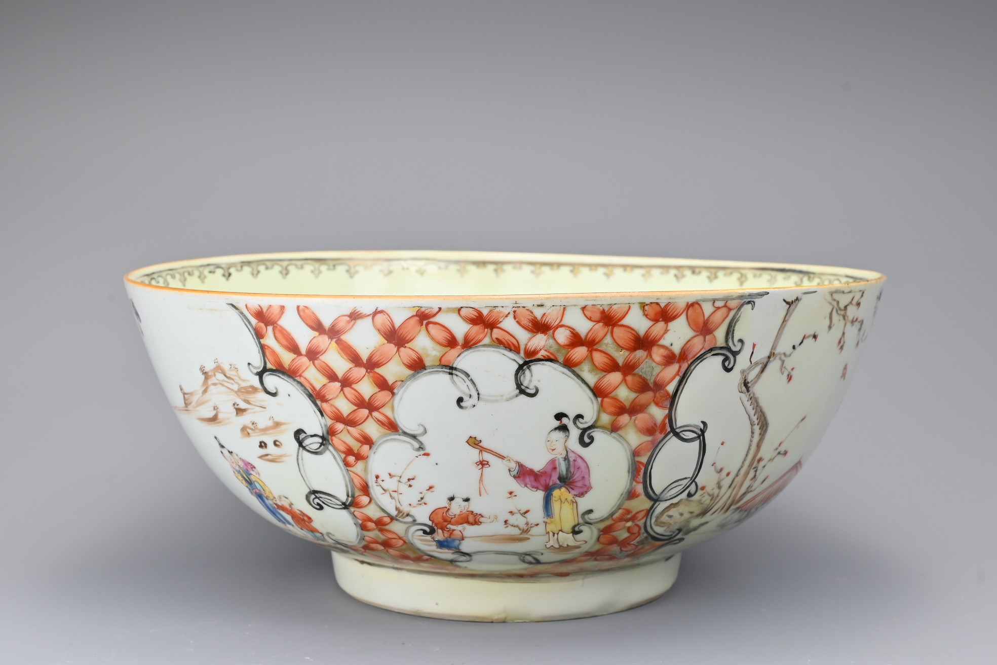 A CHINESE FAMILLE ROSE PORCELAIN PUNCH BOWL , 18TH CENTURY. Decorated to the exterior with various - Image 4 of 8