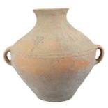 A CHINESE NEOLITHIC POTTERY JAR, MACHANG PHASE. With two looped handles and conical base decorated