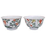 TWO CHINESE FAMILLE VERTE PORCELAIN CUPS, KANGXI PERIOD (1662-1722). Both with floral decoration and