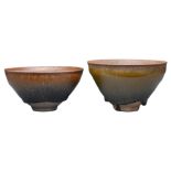 TWO CHINESE JIANYAO HARE'S FUR POTTERY TEA BOWLS. Each covered in a black lustrous glaze pooling