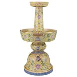 A CHINESE YELLOW-GROUND FAMILLE ROSE PORCELAIN CANDLE STICK, QIANLONG MARK, QING DYNASTY