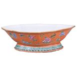 A CHINESE LOBBED PORCELAIN BOWL, TONGZHI PERIOD (1861-74). The lobed bowl covered in an orange-