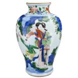 A CHINESE WUCAI PORCELAIN JAR. Of baluster form decorated with ladies and children playing in