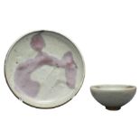 A CHINESE JUNYAO PURPLE-SPLASHED DISH AND BOWL. Both covered in a mushroom tone glaze with reddish