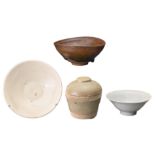 GROUP OF FOUR CHINESE POTTERY ITEMS. To include a Song dynasty Jian hare's fur pottery tea bowl, a