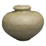 A CHINESE LONGQUAN CELADON JAR, 13TH CENTURY. The rounded globular body with moulded decoration of a