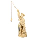 A CHINESE IVORY MODEL OF A FISHERMAN, 19TH CENTURY. The man stood on a rocky base holding his