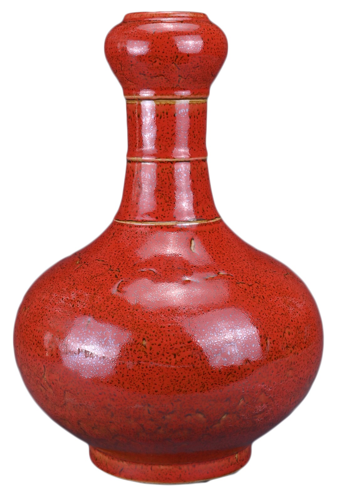 A CHINESE CORAL-GROUND 'GARLIC-MOUTH' VASE. The vase with bulbous body and bamboo form neck