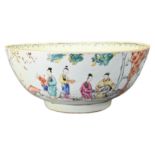 A CHINESE FAMILLE ROSE PORCELAIN PUNCH BOWL , 18TH CENTURY. Decorated to the exterior with various