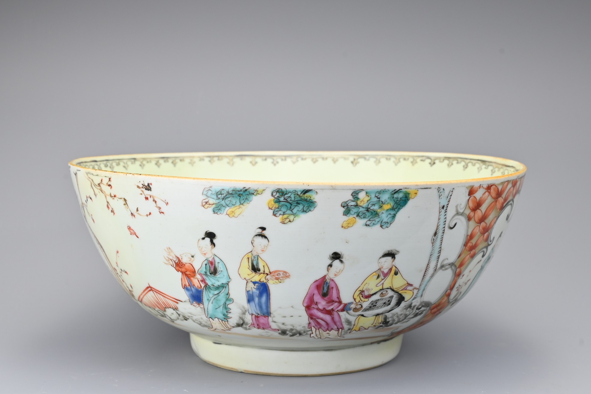 A CHINESE FAMILLE ROSE PORCELAIN PUNCH BOWL , 18TH CENTURY. Decorated to the exterior with various - Image 3 of 8