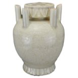 A CHINESE QINGBAI-GLAZED FIVE SPOUTED JAR. The ovoid body carved with floral scrolls, with five
