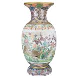 A JAPANESE CERAMIC VASE, 19/20TH CENTURY. Decorated in polychrome enamels with quails and birds in a