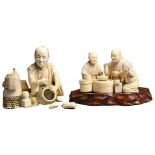 TWO JAPANESE SIGNED IVORY OKIMONOS, MEIJI PERIOD. To include a sectional group of family enjoying
