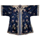 A CHINESE WOMEN'S SILK ROBE, 19/20TH CENTURY. Blue-ground embroidered with butterflies and floral