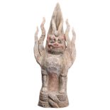 A CHINESE PAINTED POTTERY FIGURE OF AN EARTH SPIRIT, ZHENMUSHOU, TANG DYNASTY (618-907). The