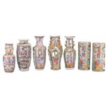 A GROUP OF SEVEN CHINESE CANTON FAMILLE ROSE PORCELAIN VASES, 19TH CENTURY. All of various forms