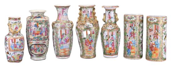 A GROUP OF SEVEN CHINESE CANTON FAMILLE ROSE PORCELAIN VASES, 19TH CENTURY. All of various forms