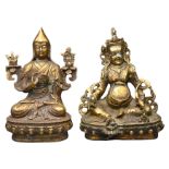 TWO SINO-TIBETAN BRONZE FIGURES. To include a figure of a Lama seated on a lotus base with incised