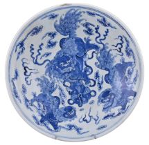 A CHINESE BLUE AND WHITE PORCELAIN CHARGER, 19TH CENTURY. Decorated with Foo Dogs and brocade ball
