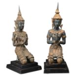 PAIF OF THAI THEPHANOM BRONZE FIGURES. The angel figures kneeling with hands together on wooden