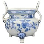 A CHINESE BLUE AND WHITE PORCELAIN TRIPOD CENSER. The globular body on three animal form feet with