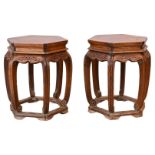 PAIR OF CHINESE HARDWOOD HEXAGONAL STOOLS. With floral scroll apron carved in relief with six gently
