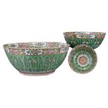 THREE CHINESE FAMILLE VERTE BOWLS, EARLY 20TH CENTURY. To include a large punch bowl with two