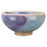 A SMALL CHINESE JUNYAO PURPLE-SPLASHED BOWL. Potted with deep rounded sides on a tapered foot