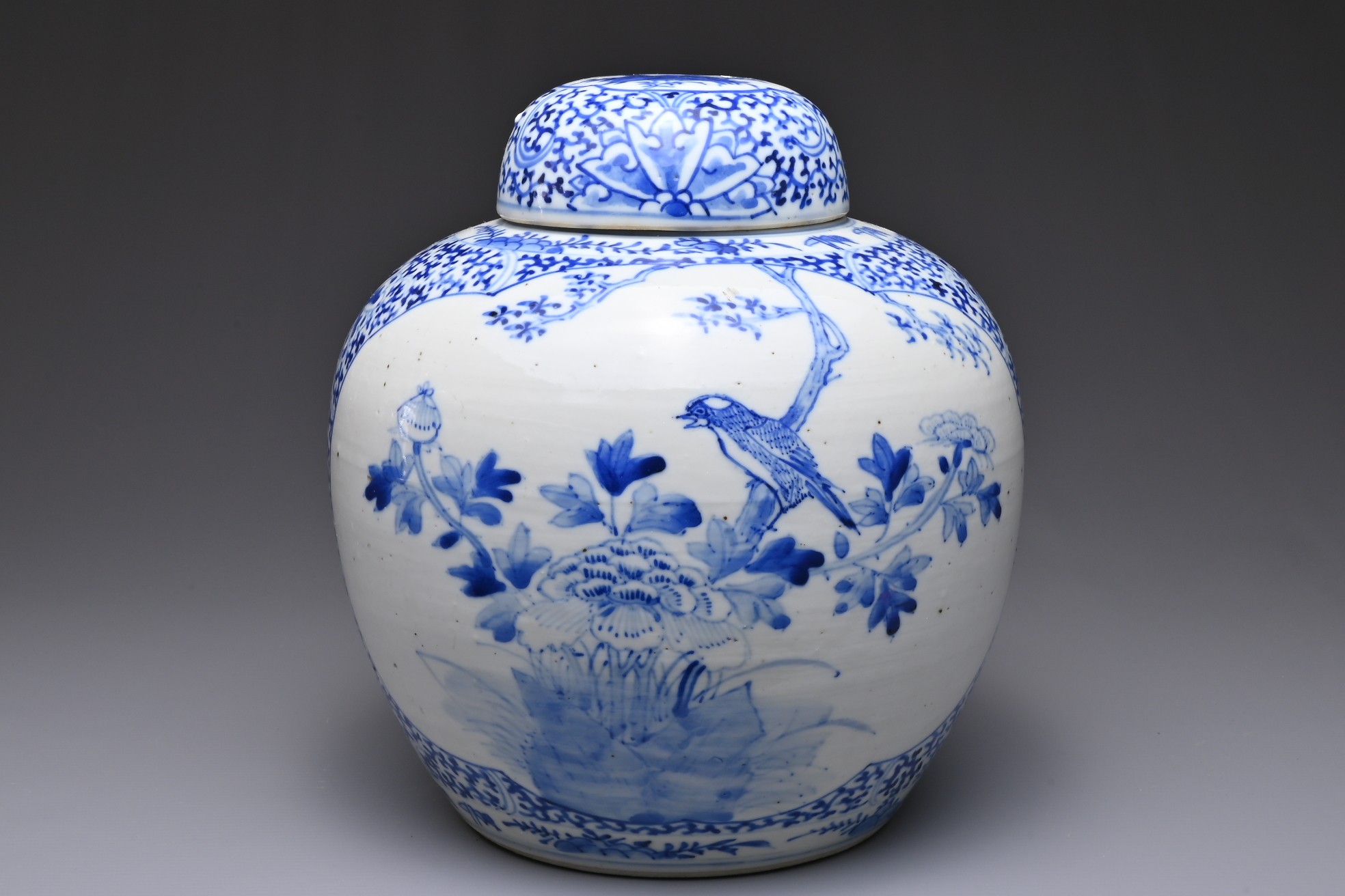 A CHINESE BLUE AND WHITE PORCELAIN GINGER JAR AND COVER, 19TH CENTURY. Decorated with birds in - Image 2 of 8