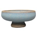 A CHINESE JUNYAO PURPLE-SPLASHED BOWL. The bowl thickly potted on a stem foot. Covered in a sky blue