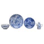 FOUR CHINESE BLUE AND WHITE PORCELAIN ITEMS, 18/19TH CENTURY. To include two deep dishes with floral